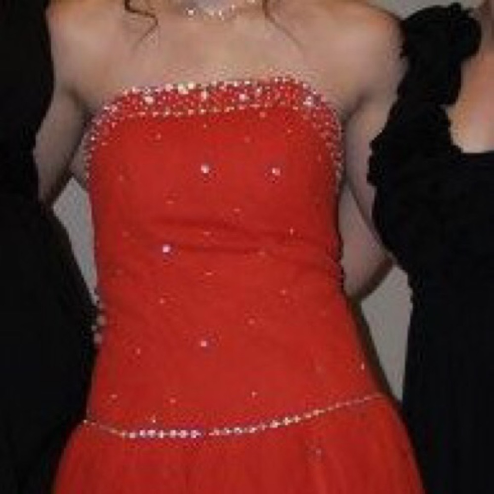 Bright red prom/quinceañera dress with sequins